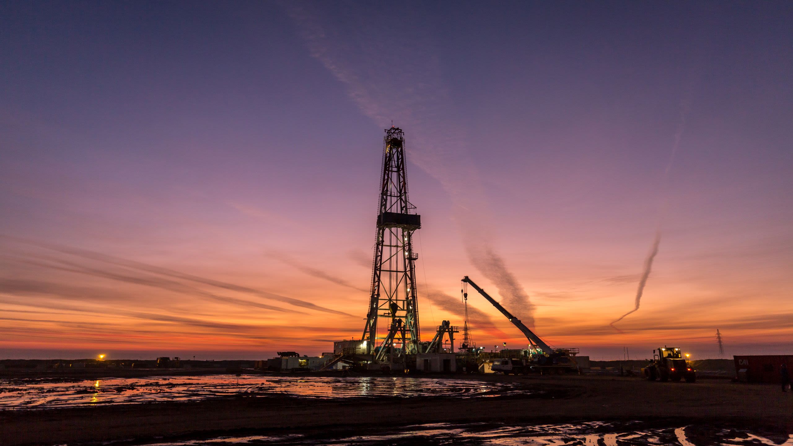 fracking oil rig at dawn