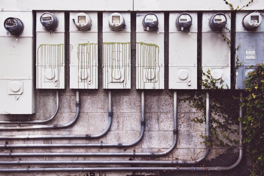 gray photography of electric meters