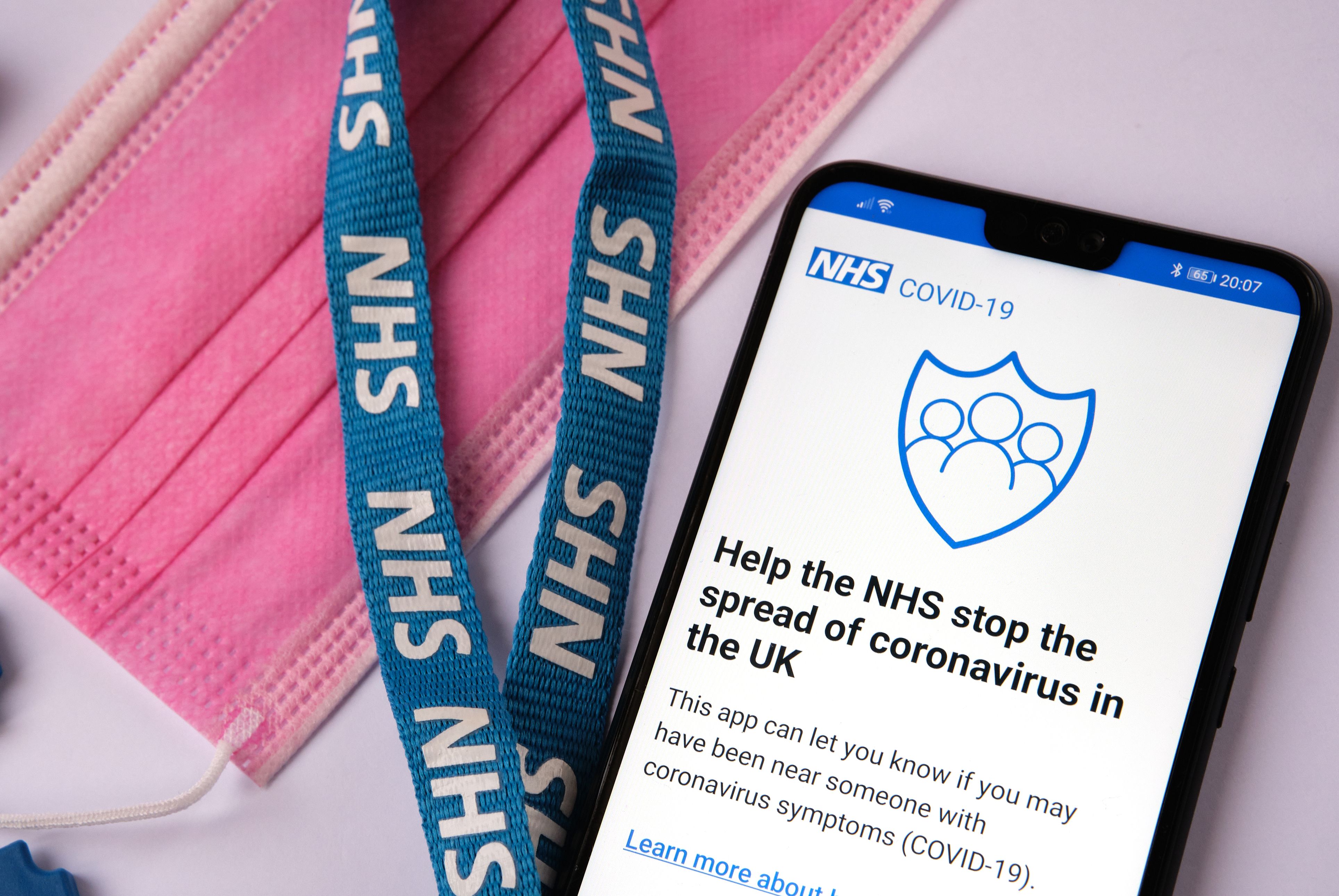 Mobile phone showing the NHS COVID-19 contact tracing app