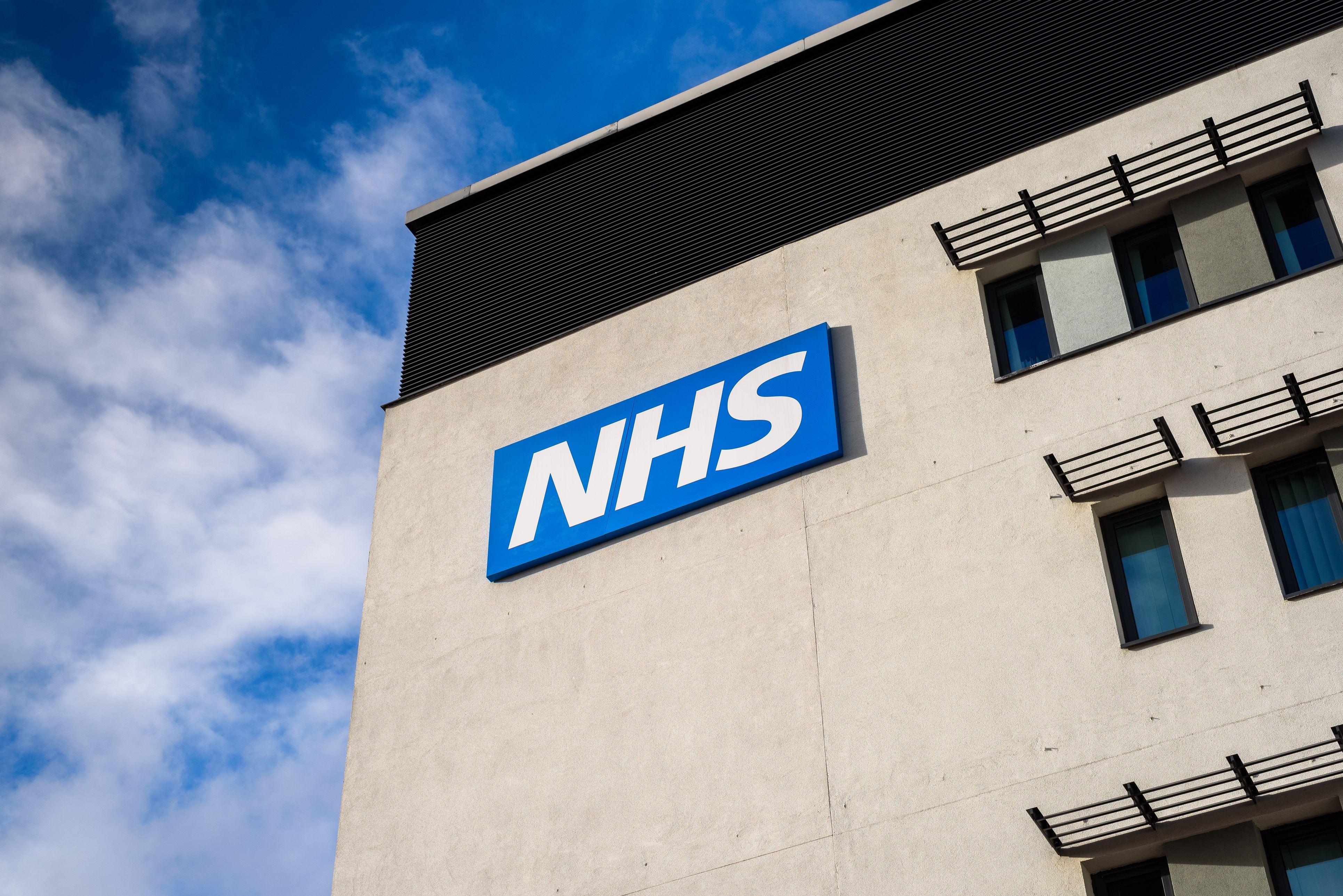A building with the NHS logo on the outside