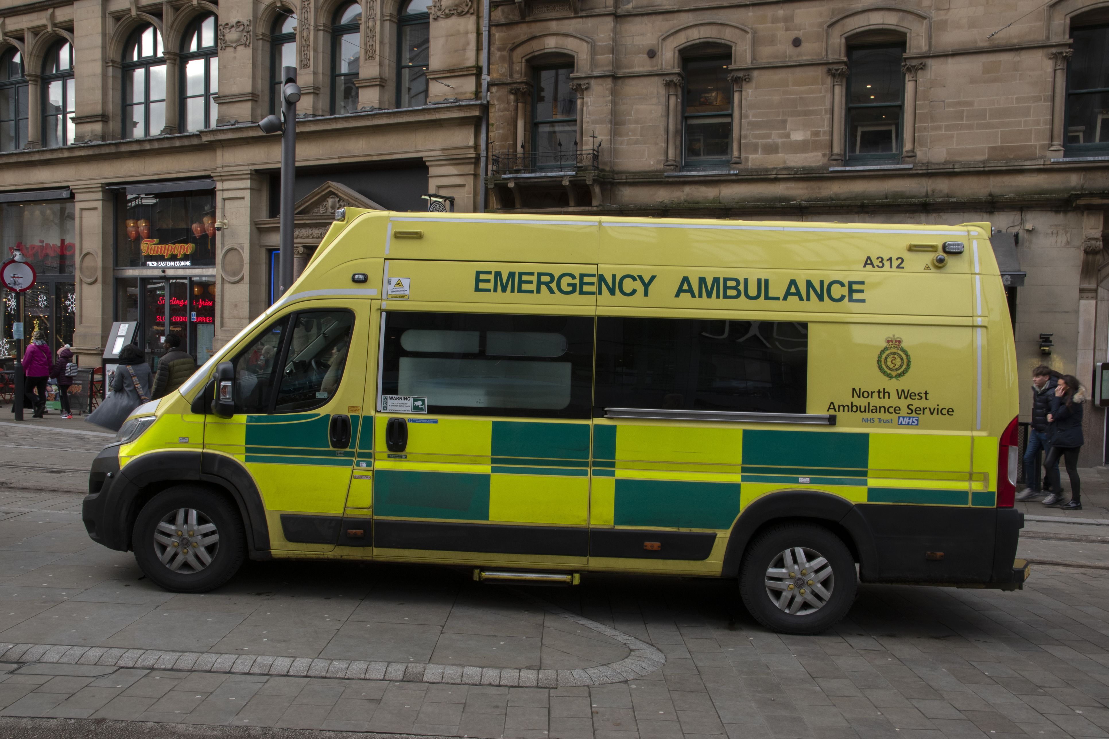 Row of ambulances outside a hospital