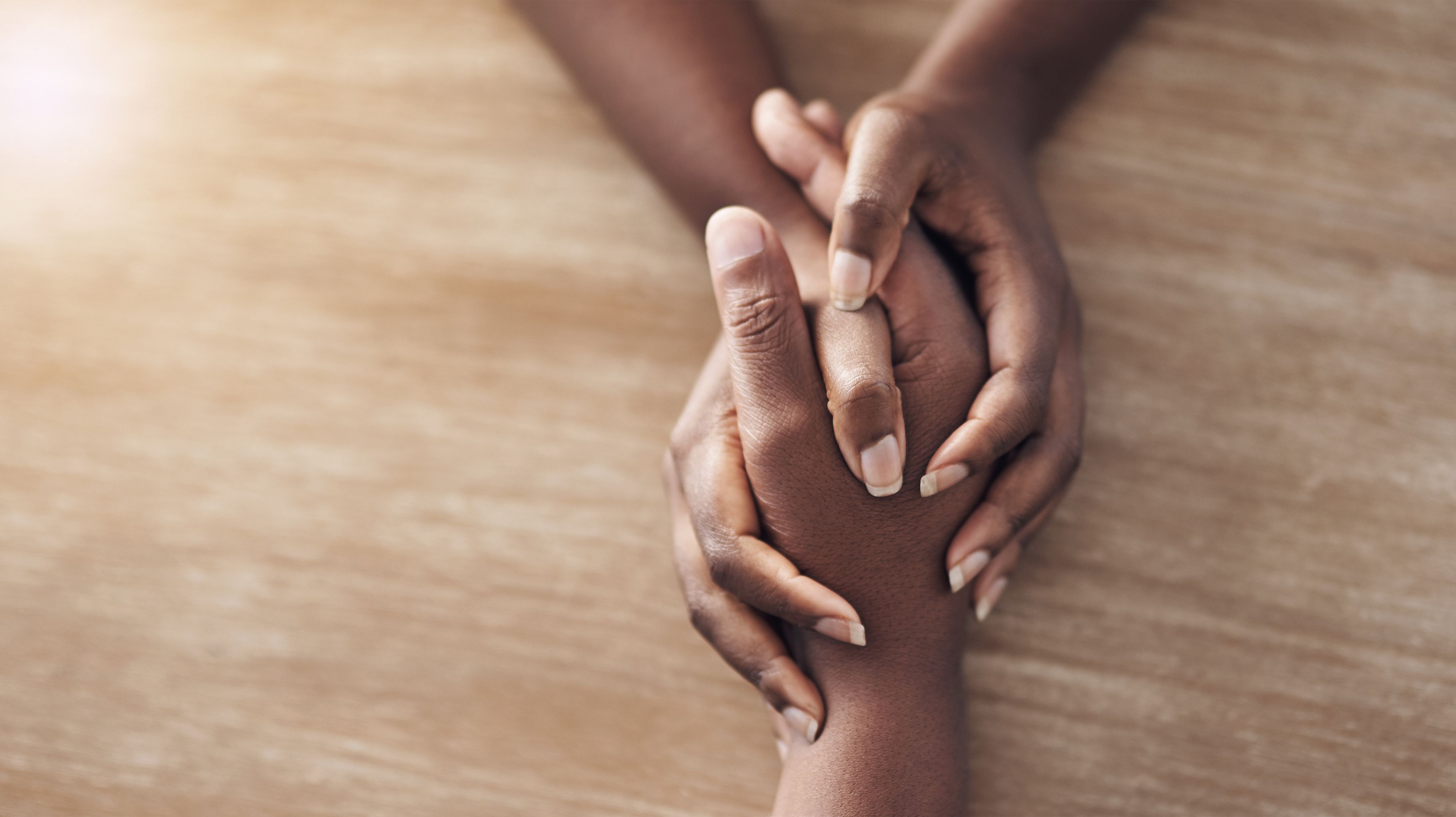Two hands holding
