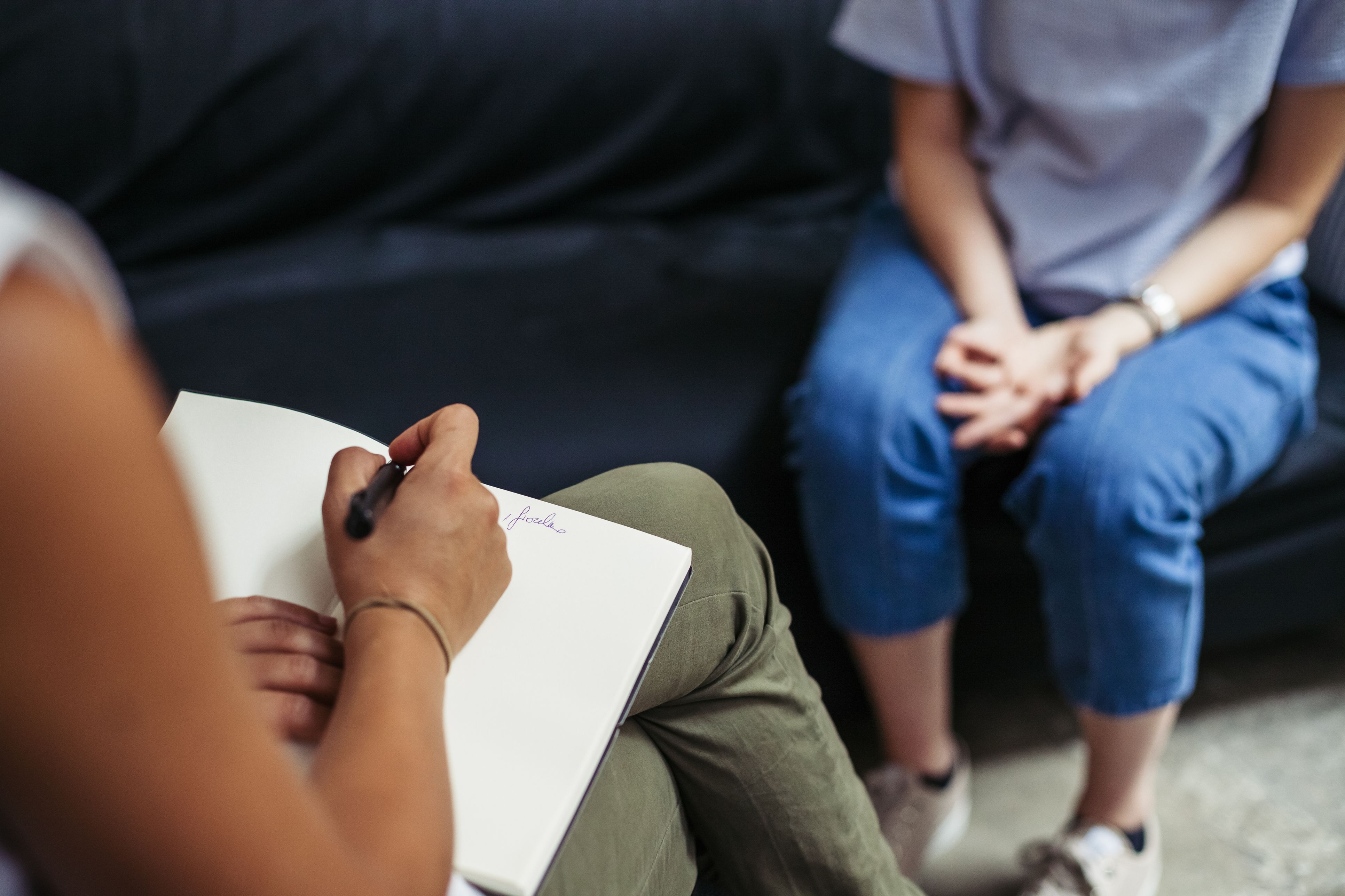 A woman in a talking therapy session