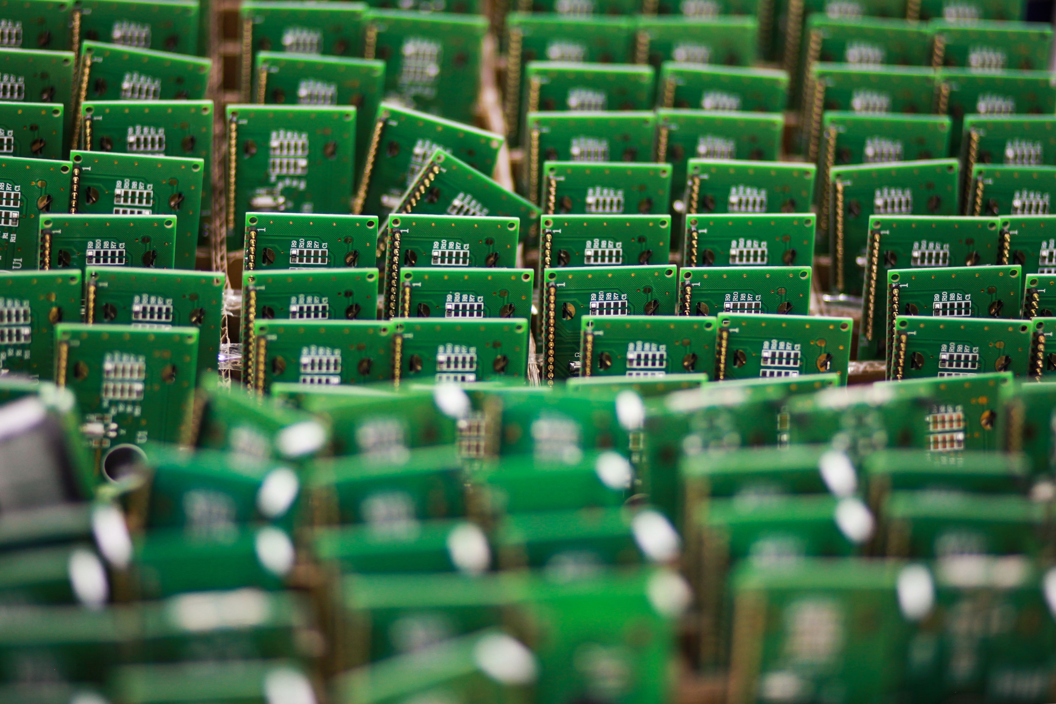 Image of lots of semiconductor chips in a row.