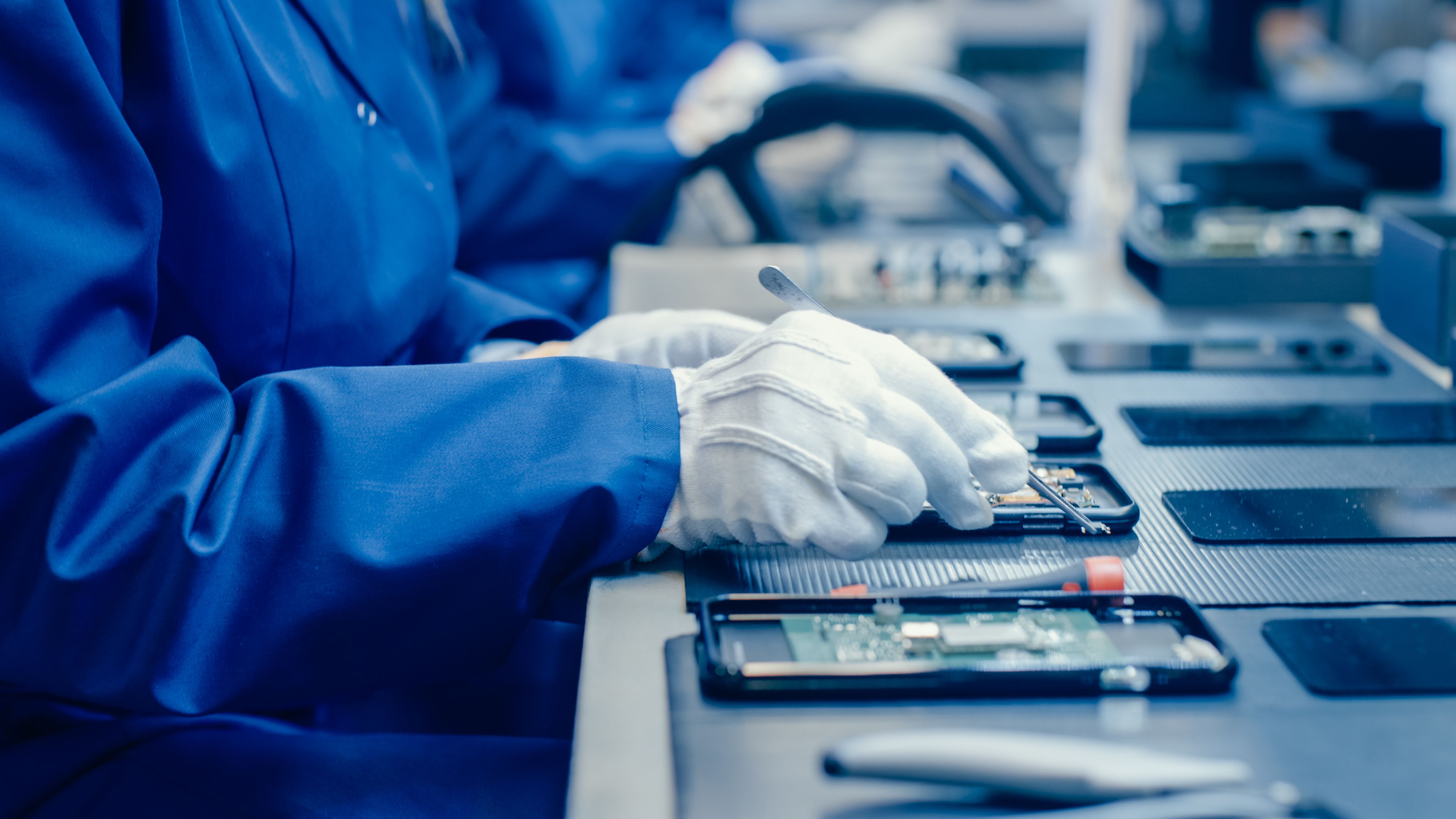 Scientist or engineer in a lab working on robotics