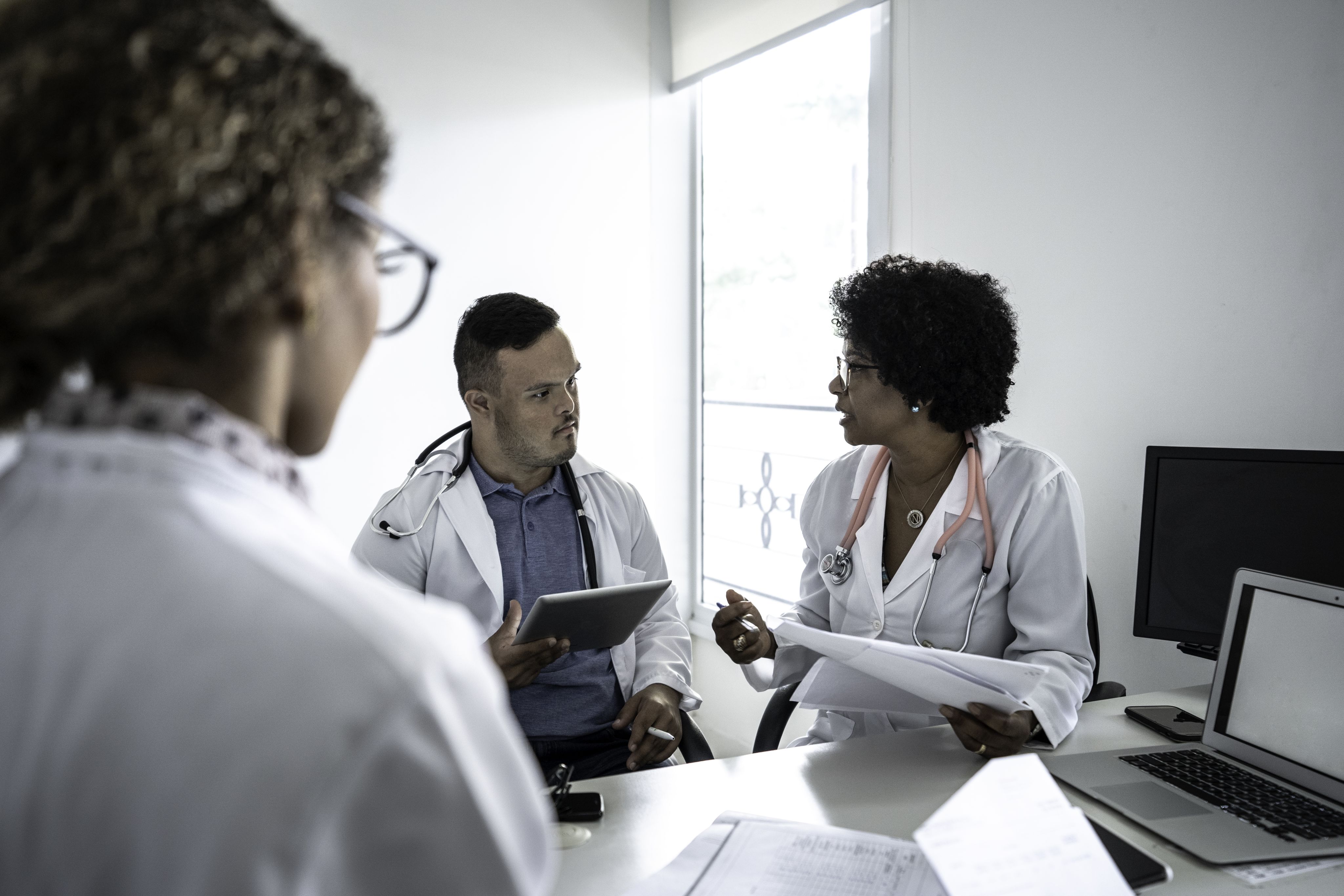 Doctors meeting and chatting