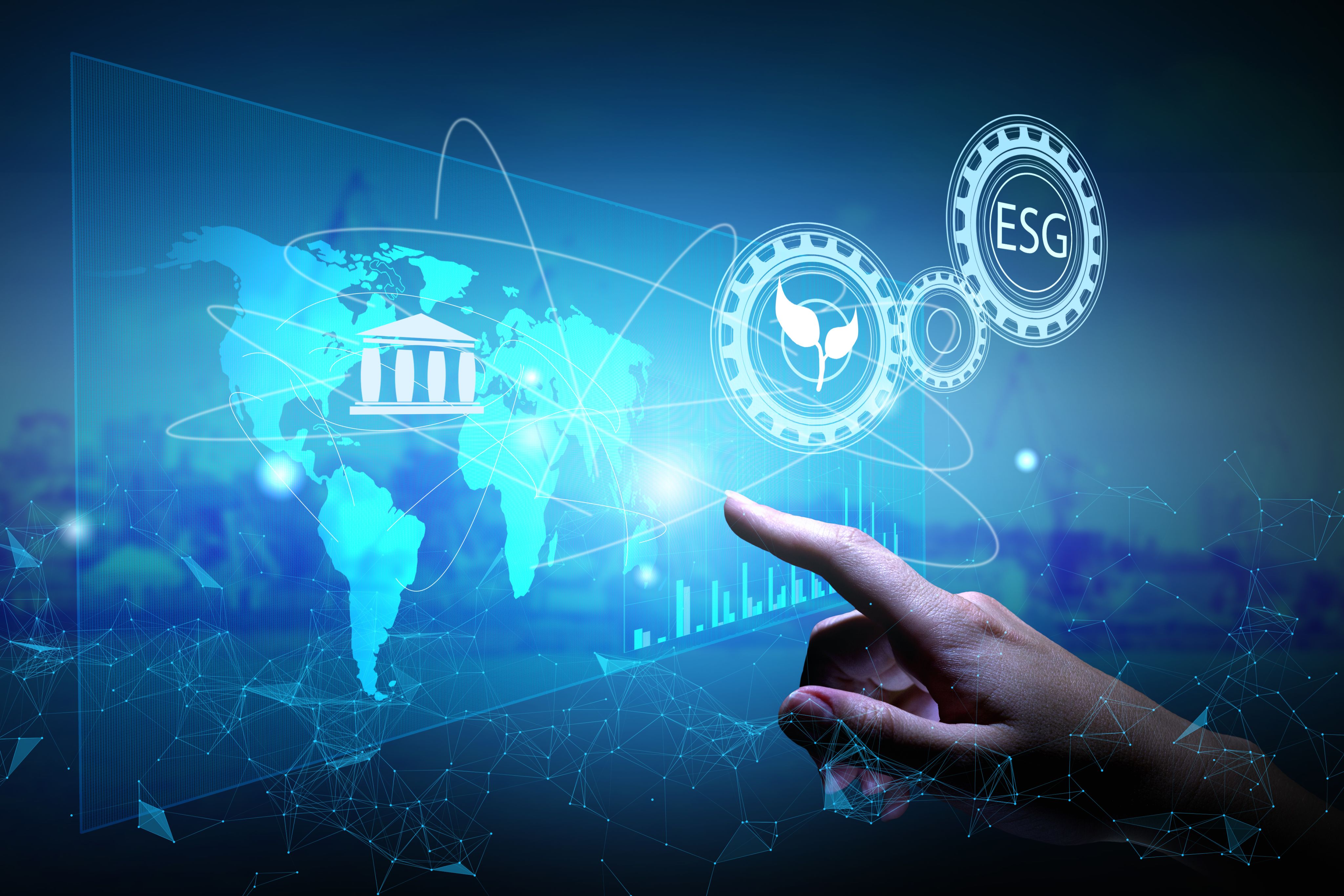 Futuristic image of the world map overlayed with images, being interacted with by a person's finger.