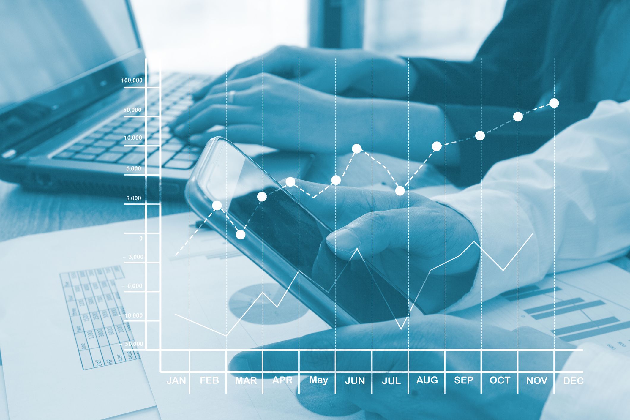 Image of a phone in a hand with an abstract line chart overlayed.