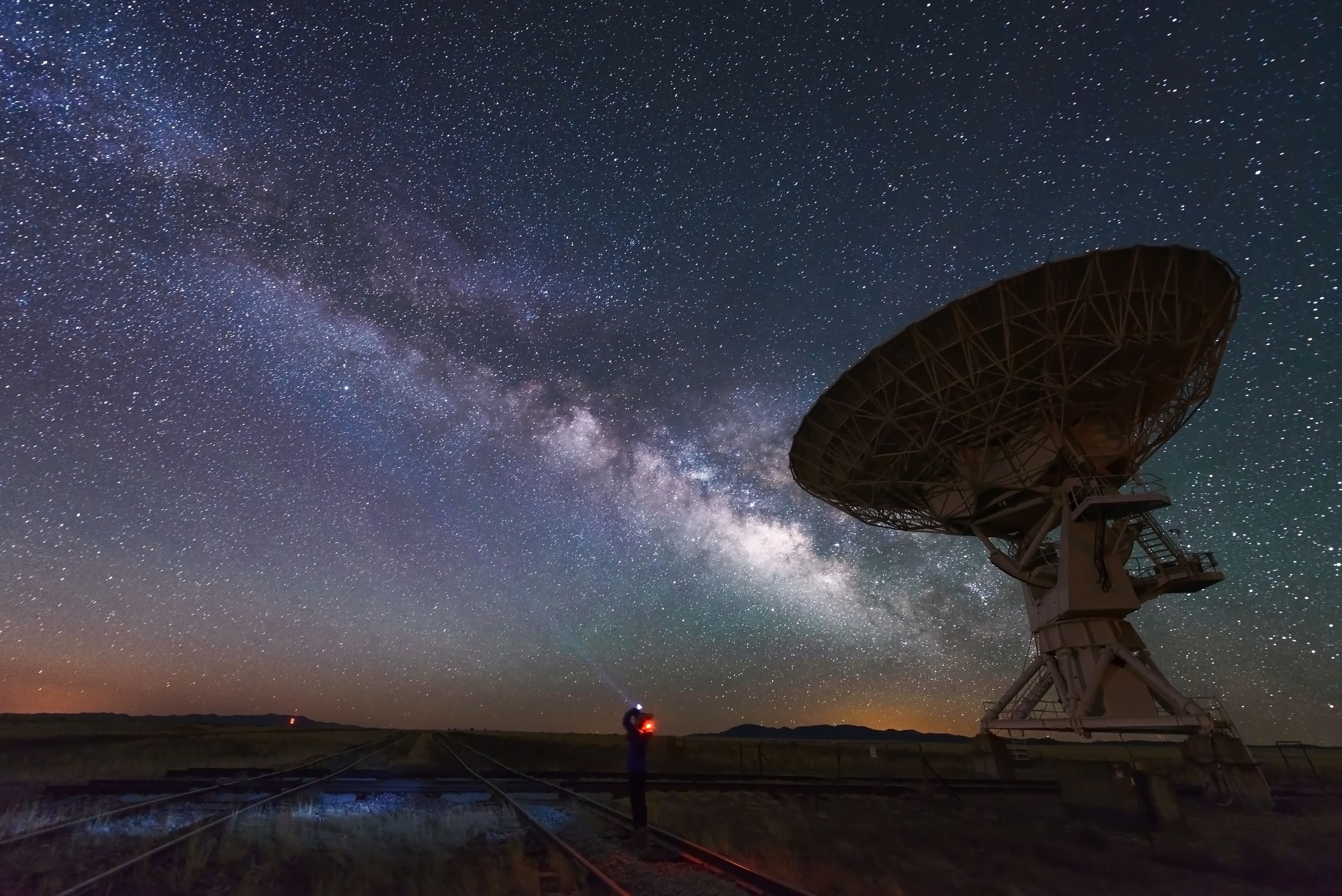 Milky way and big antenna dish at Very Large Array, New Mexico, USA.