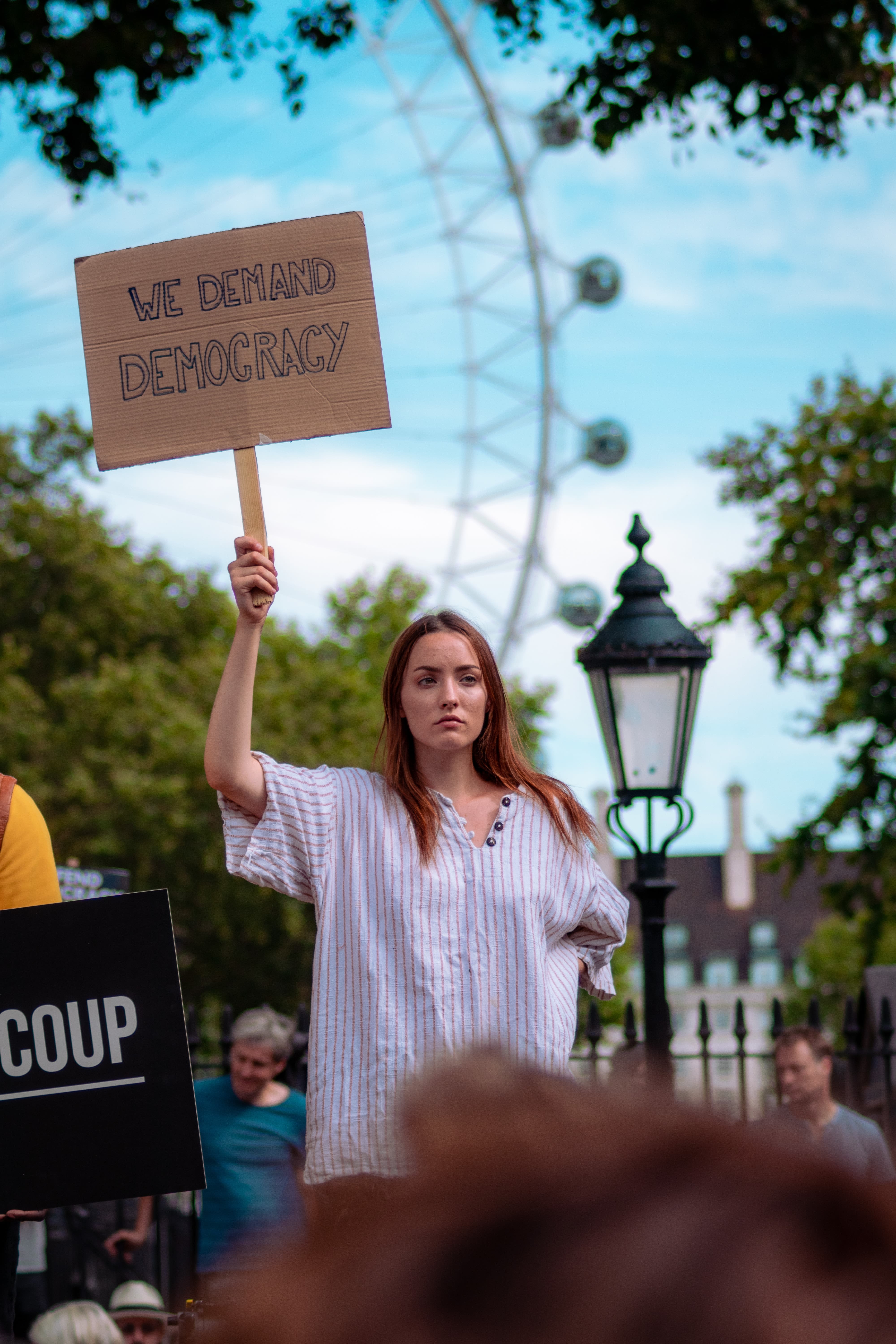 woman holding placard